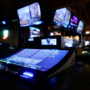 a casino machine with multiple screens