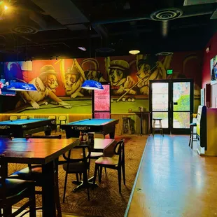 pool tables &amp; door to empty patio