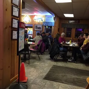 diners sitting at tables in a restaurant