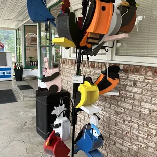 a display of colorful hats on a stand