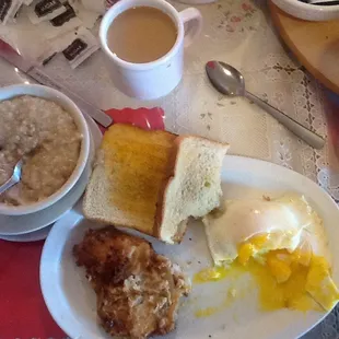 a breakfast of eggs, toast, and oatmeal
