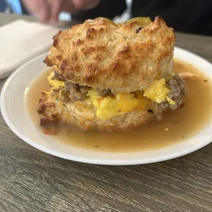 biscuit sandwich with smothered green chili