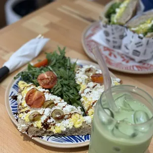 Iced matcha latte and goat cheese toast