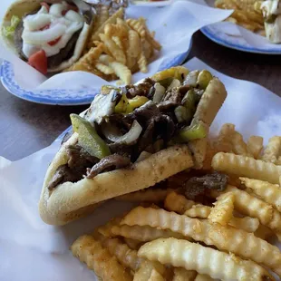The &quot;Works&quot; cheesesteak and Lamb/Beef gyro with garlic fries