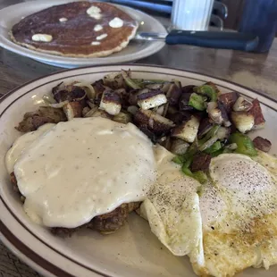 Chicken fried steak, country, potatoes, eggs, all easy