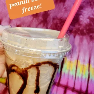 a person holding a cup of coffee