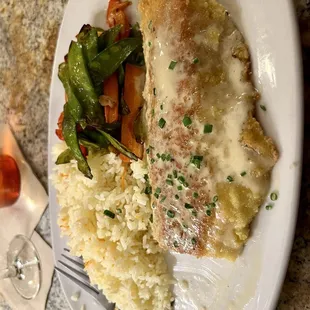 Walleye, rice ( so good) and veggies.