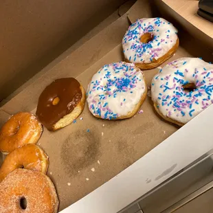 a variety of donuts in a box