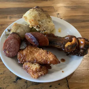 Lunch buffet round 1: chicken teriyaki, sausage, beef rib, lemon chicken.