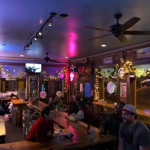 people sitting at the bar