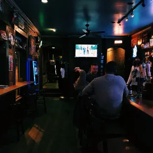 people sitting at the bar
