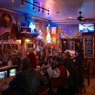 people sitting at the bar