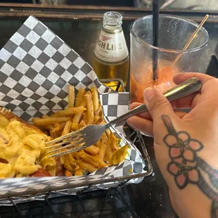 Jalapeno Popper Mac N' Cheese Brat and BloodyMary w/ Miller chaser.  LOVE IT!!