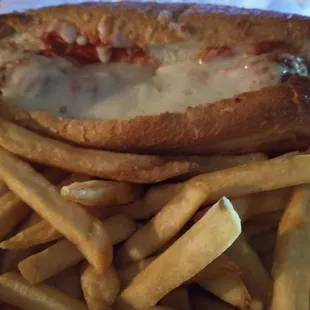Meatball sandwich and french fries.