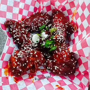 Korean fried wings. Just tasted gochujang in the seasoning.