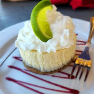 a slice of key lime cheesecake