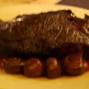 The dry aged bone in Kansas strip steak was tasty