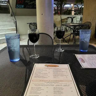 Wine on the patio, about to order our meals