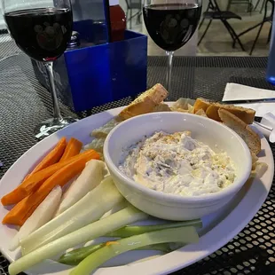 Spinach artichoke dip with a variety of dip options