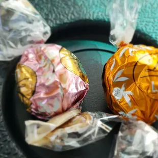 The left one is melted from being placed on top of the hot soup and leaking into wrapping