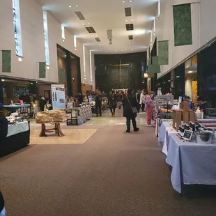 people walking through the market