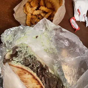 Gyro wrap and a side of French fries