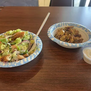 Small Fattoush with a side of grilled chicken.