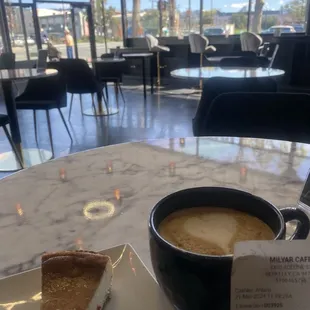 Coffee cake (4), Yemeni Latte (6.95+) facing entrance.