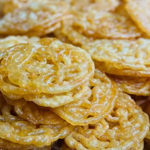 Jelabi awaits a sweet from distance lands .