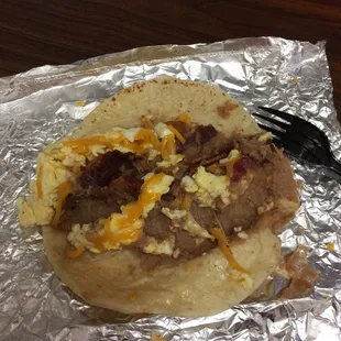 Bacon, egg, bean, cheese taco