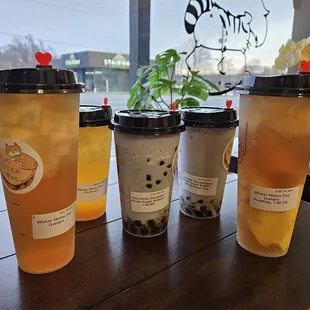 Wintermelon tea, mango green tea, taro slush, taro milk green tea, and winter melon with pudding