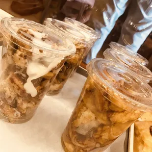 three cups of coffee and donuts