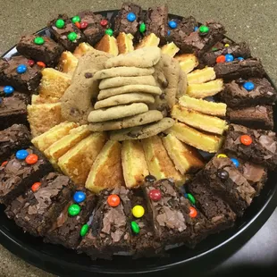 a platter of cookies and brownies