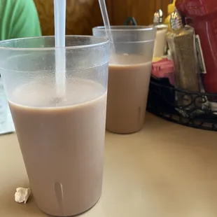 two cups of coffee on a table