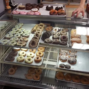 a display case full of donuts