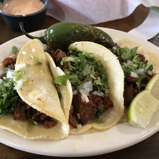 three tacos on a plate