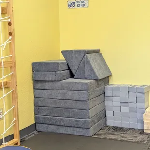 Toy cinder blocks and modular kids couch.