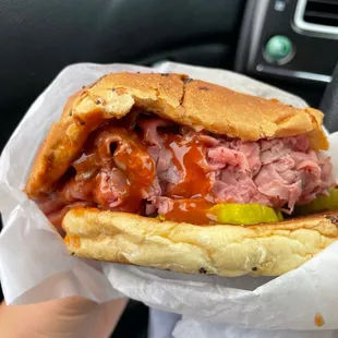 Super roast beef sandwich w bbq sauce, mayo, and pickles!