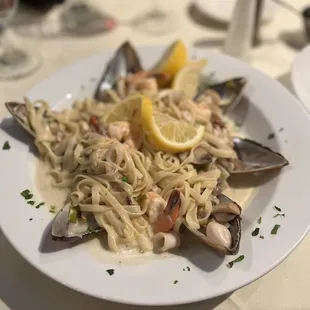 Pasta with mussels, Shrimp, calamari and a white lemon sauce