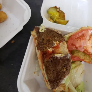 Looks like they cut the burger in four or a  rat ate it. You never know, it is in north philly