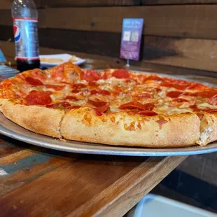 Large combo pizza, you can get up to five toppings.