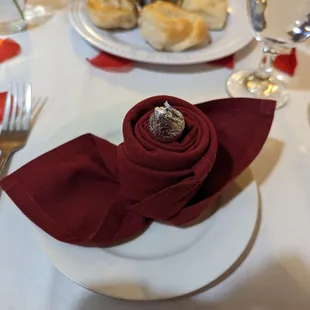 Napkins folded into rose's for Valentine's Day
