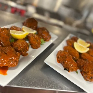 Whole chicken wings prepped in house tossed in spicy wing sauce.
