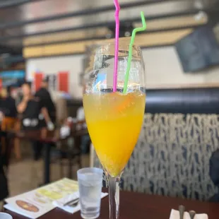 a glass of mimosa