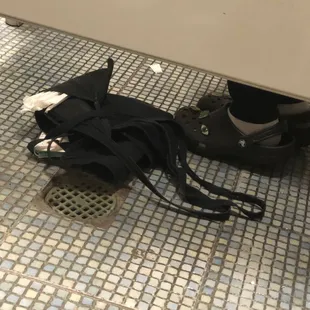 Apron on dirty floor.