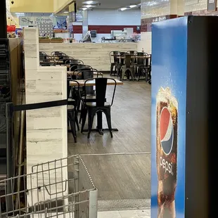 A peek into eatery seating at back of H Mart, Elden St / Herndon. Don't expect fancy! But clean, adequate and delicious food!