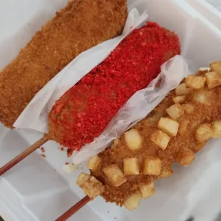two skewers of food