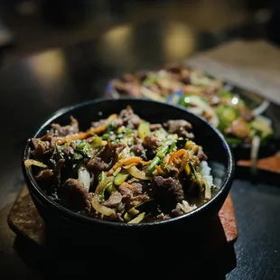 a bowl of beef and vegetables