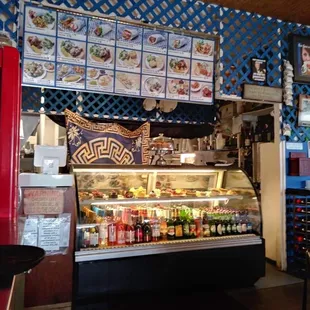 Counter with menu and desserts