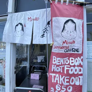 a woman's face on a banner